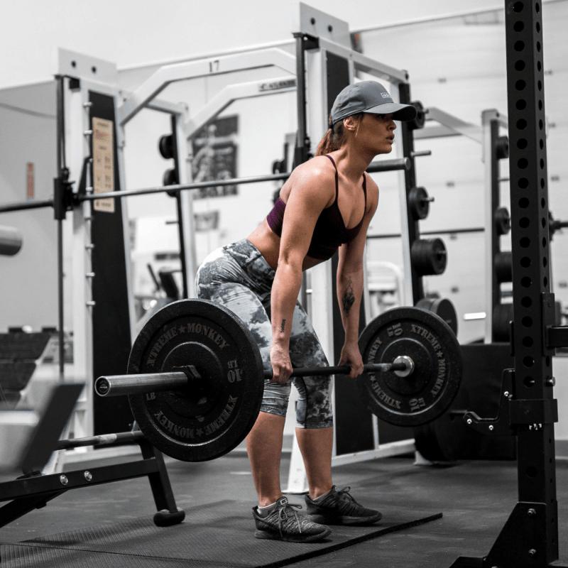 A Woman performing RDLS | Ultimate Nutrition