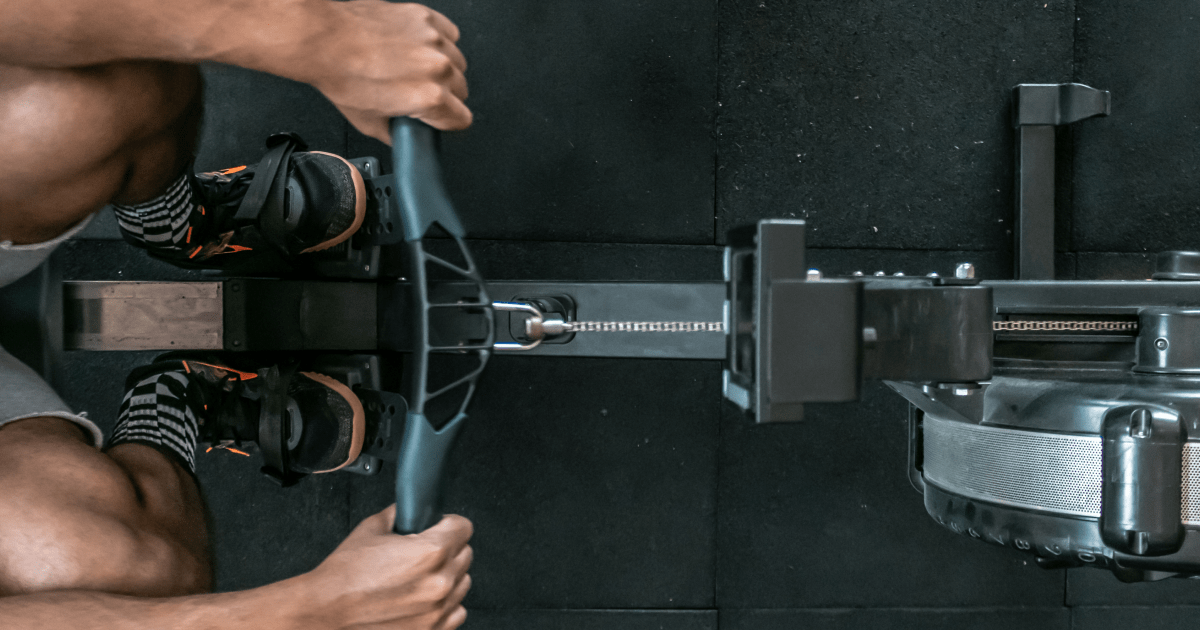 A coach and athlete rowing | Ultimate Nutrition