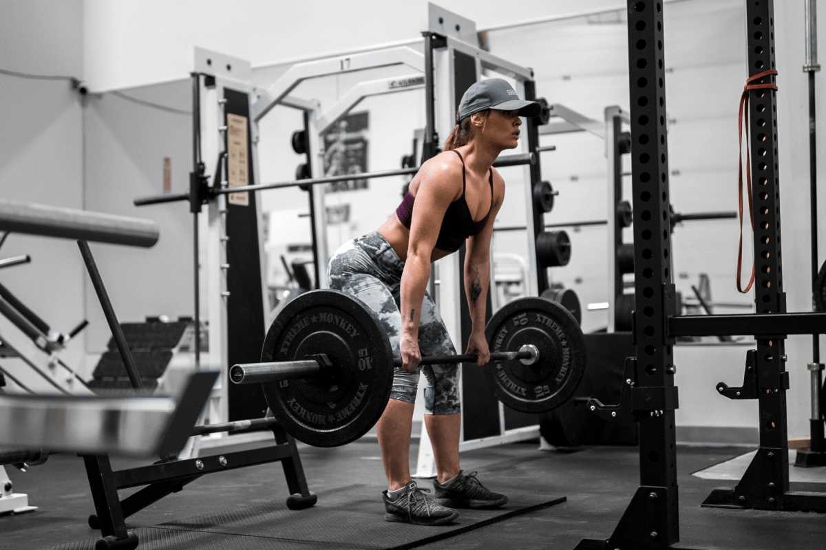 A Woman performing RDLS | Ultimate Nutrition